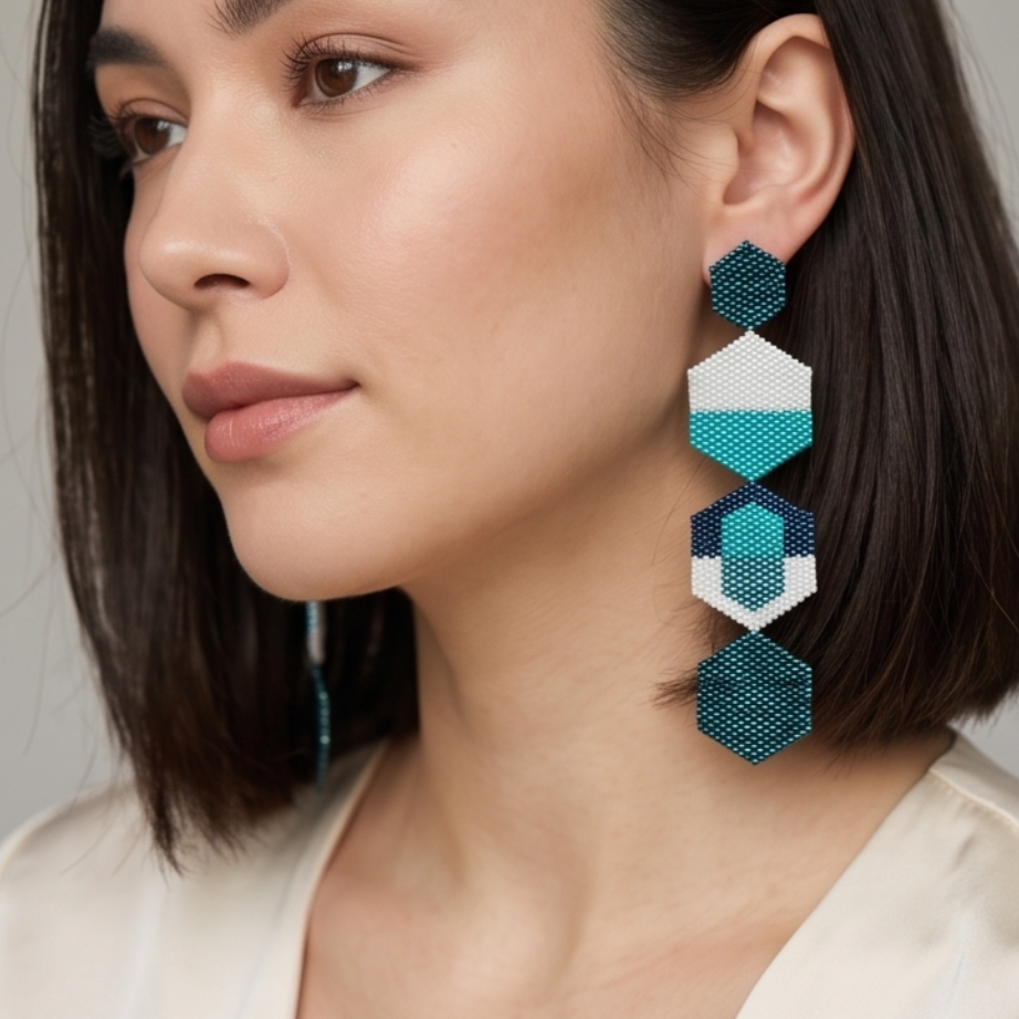 Model wearing Axis long geometric Miyuki earrings handcrafted by Dailot
