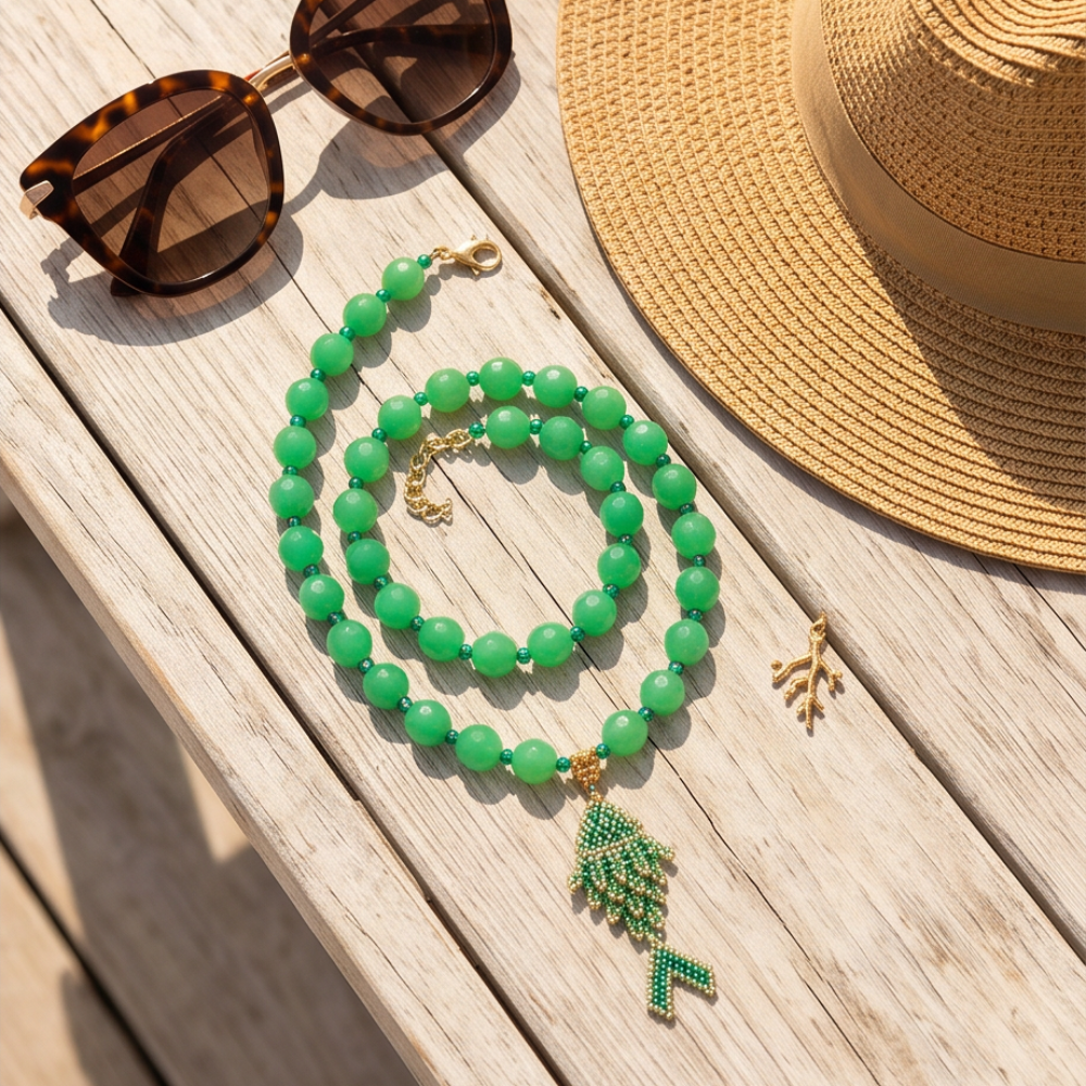 Dailot green gemstone and Miyuki fish pendant necklace styled with summer accessories