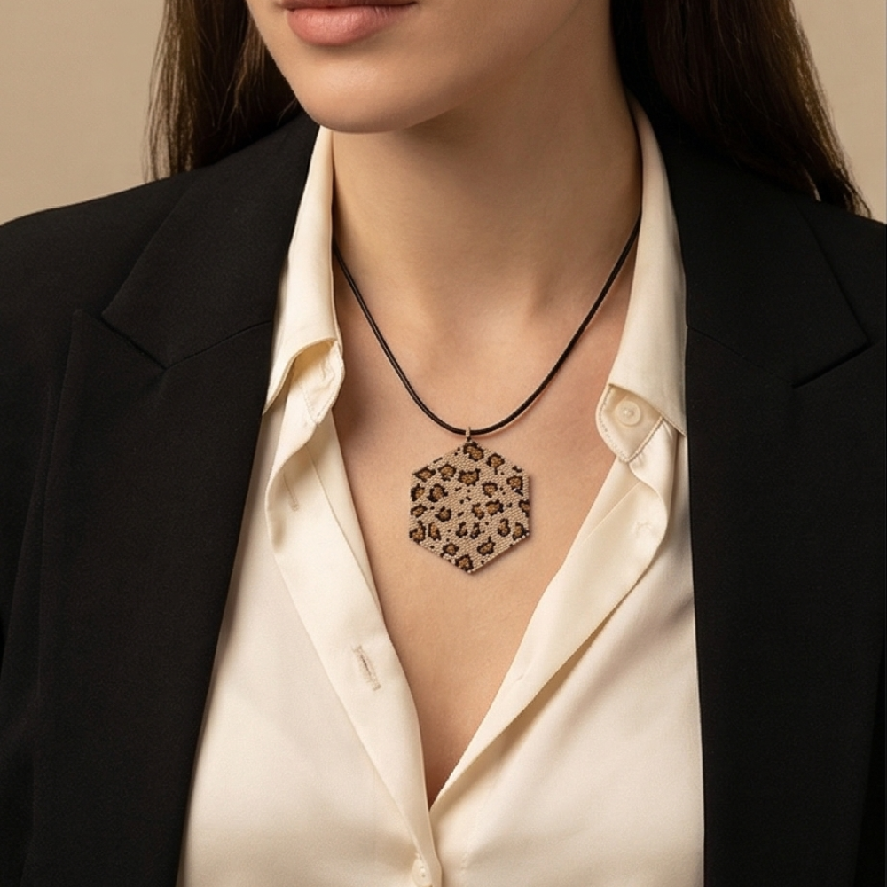 Model wearing Dailot handmade leopard print Miyuki pendant necklace