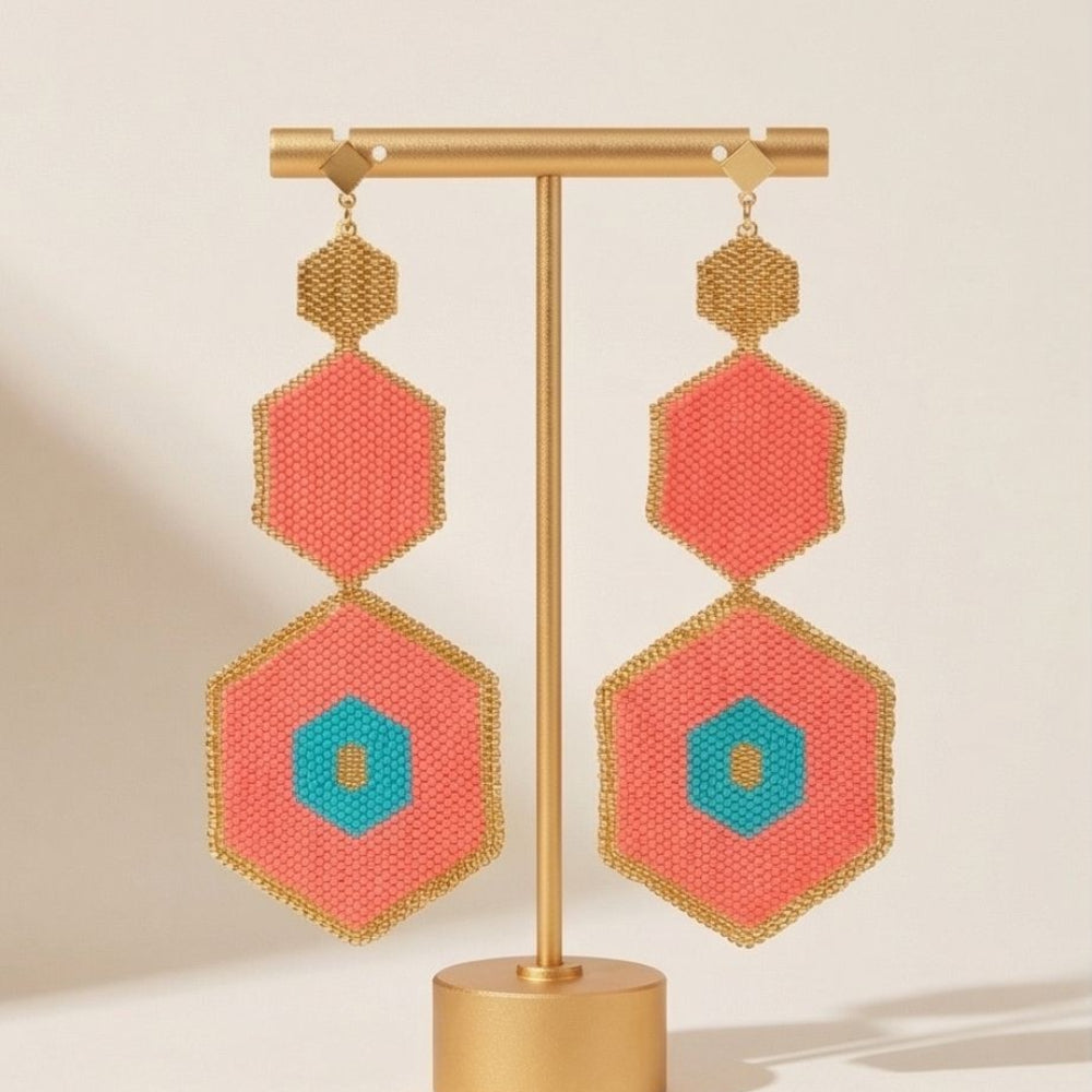 Handcrafted long geometric dangle earrings made with coral, turquoise, and gold seed beads