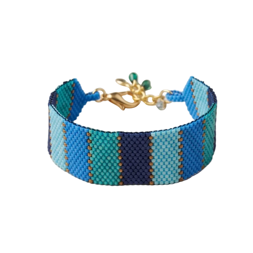 Dailot beaded bracelet with blue and turquoise stripes, gold-tone accents, and a clasp with an extender chain.