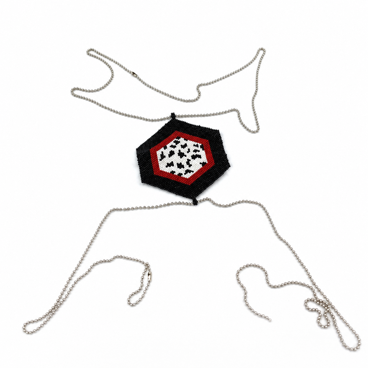 Black, red, and white hexagonal Miyuki Delica cross body chain with silver-tone ball chains arranged on a white background.