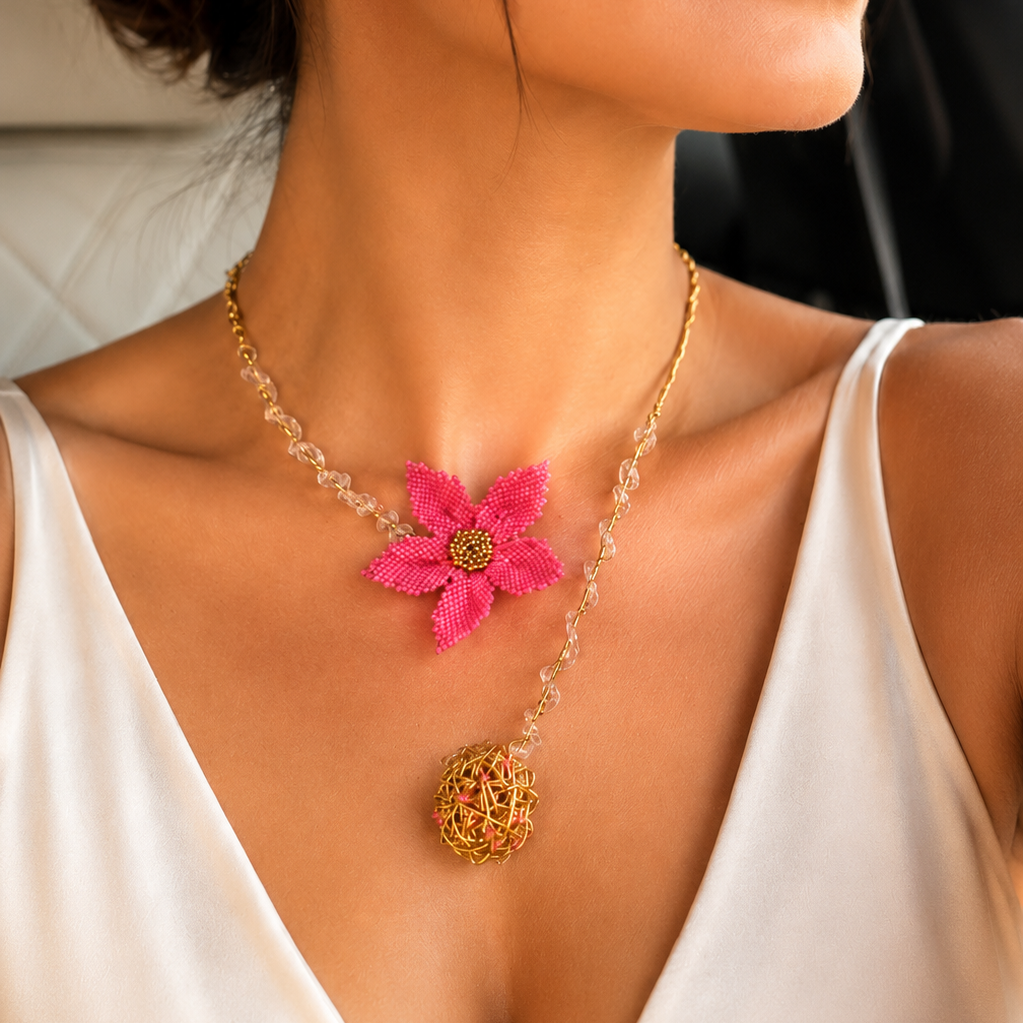 Model wearing a Dailot handmade pink flower statement necklace with gold wire details