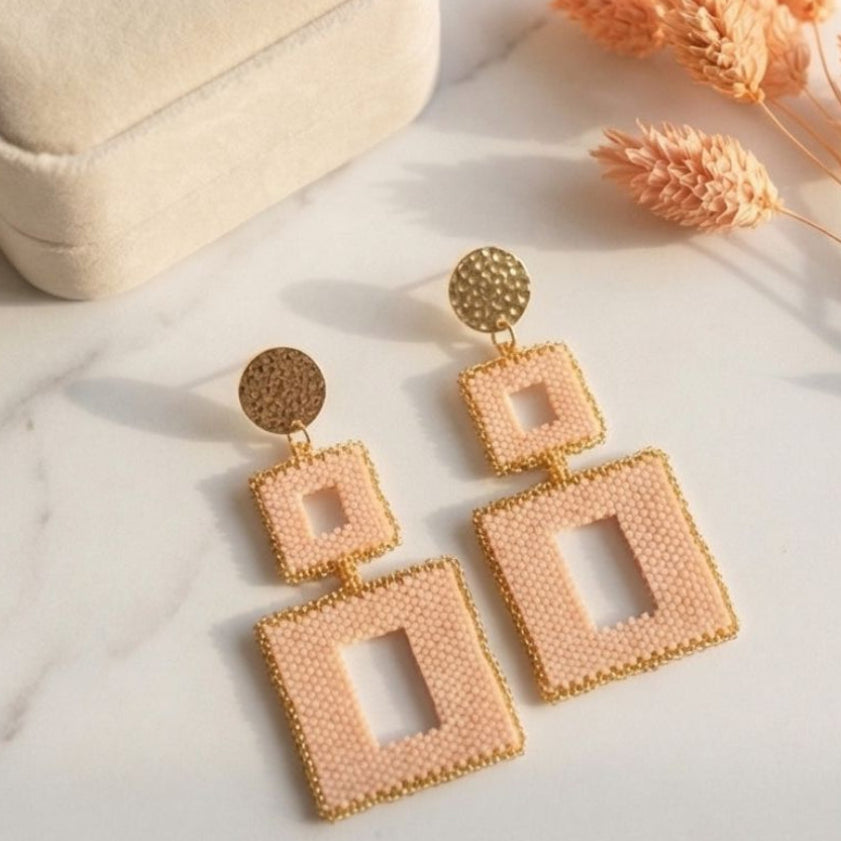 Peach geometric Miyuki beaded statement earrings with gold-tone details by Dailot