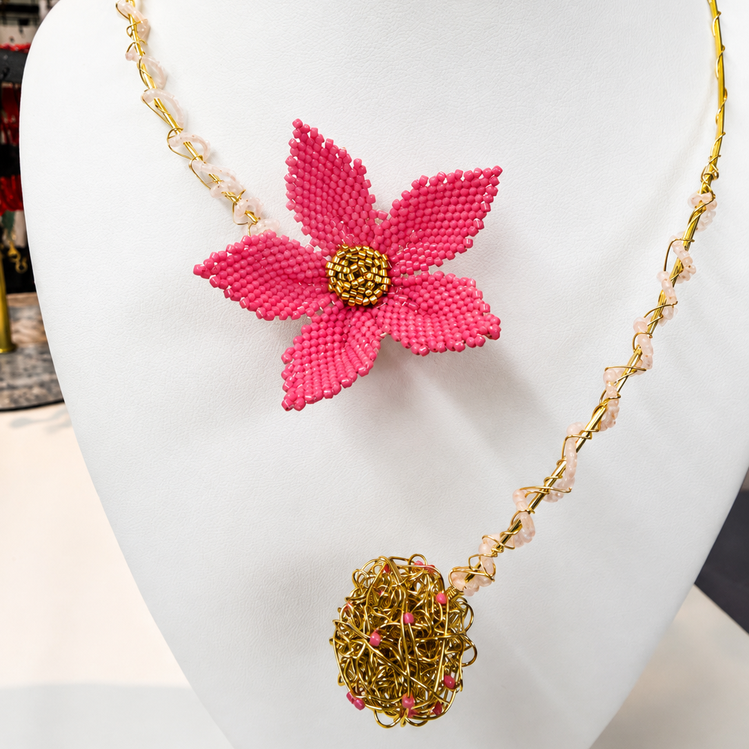Dailot Fleur handmade pink flower statement necklace with Miyuki beadwork and gold-tone wire details.