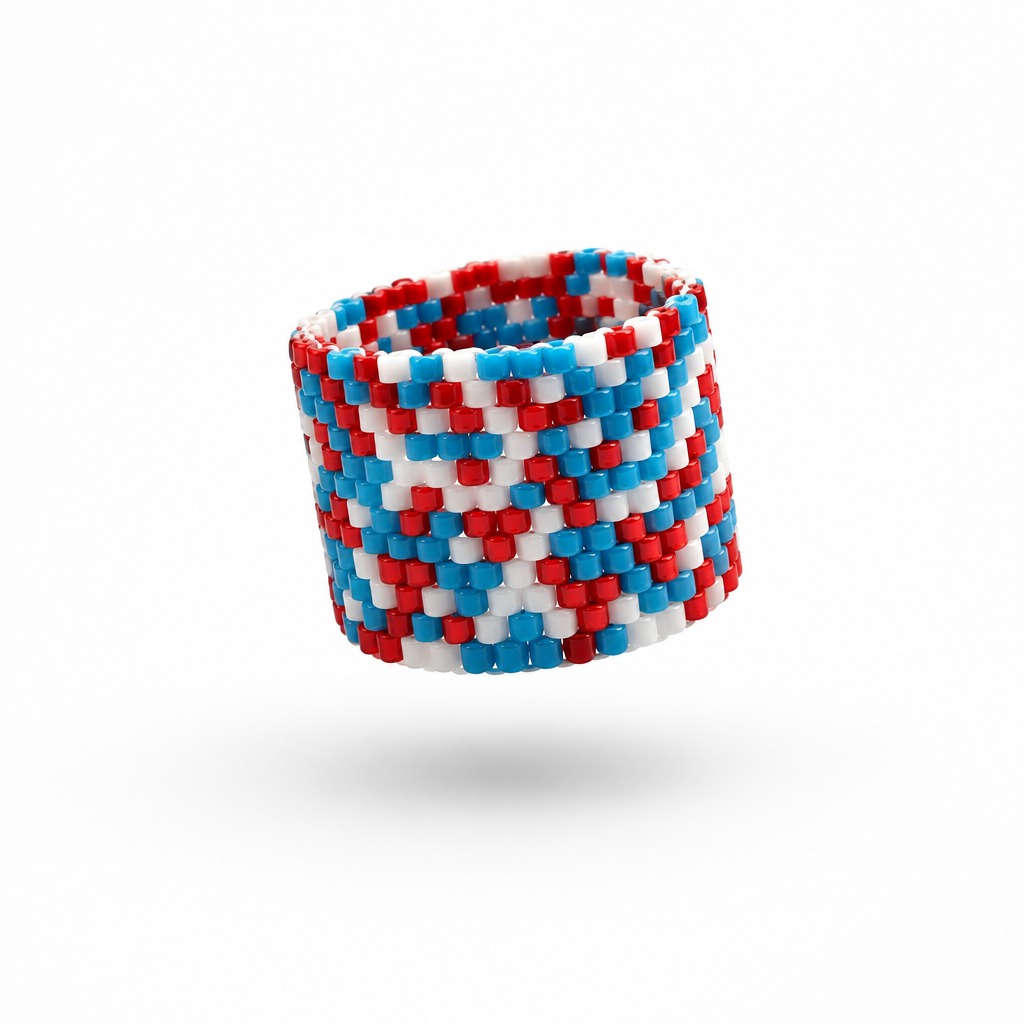 POP 16 mm Miyuki Delica ring in red, blue and white with a repeating geometric bead-woven pattern