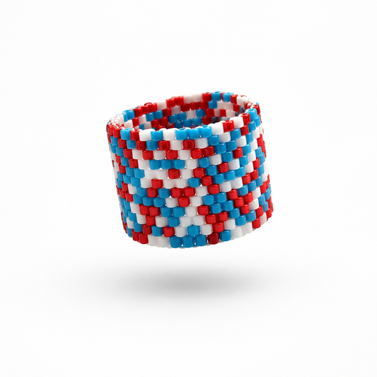 POP 16 mm Miyuki Delica ring in red, blue and white with a repeating geometric bead-woven pattern