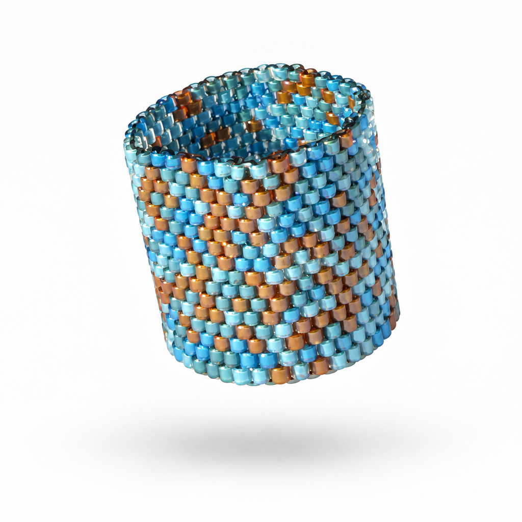 Tides 21 mm Miyuki Delica ring with blue, turquoise and warm metallic geometric beadwork