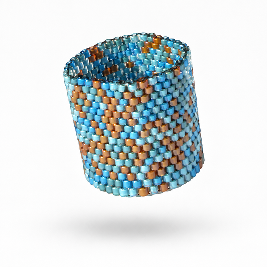 Tides 21 mm Miyuki Delica ring with blue, turquoise and warm metallic geometric beadwork