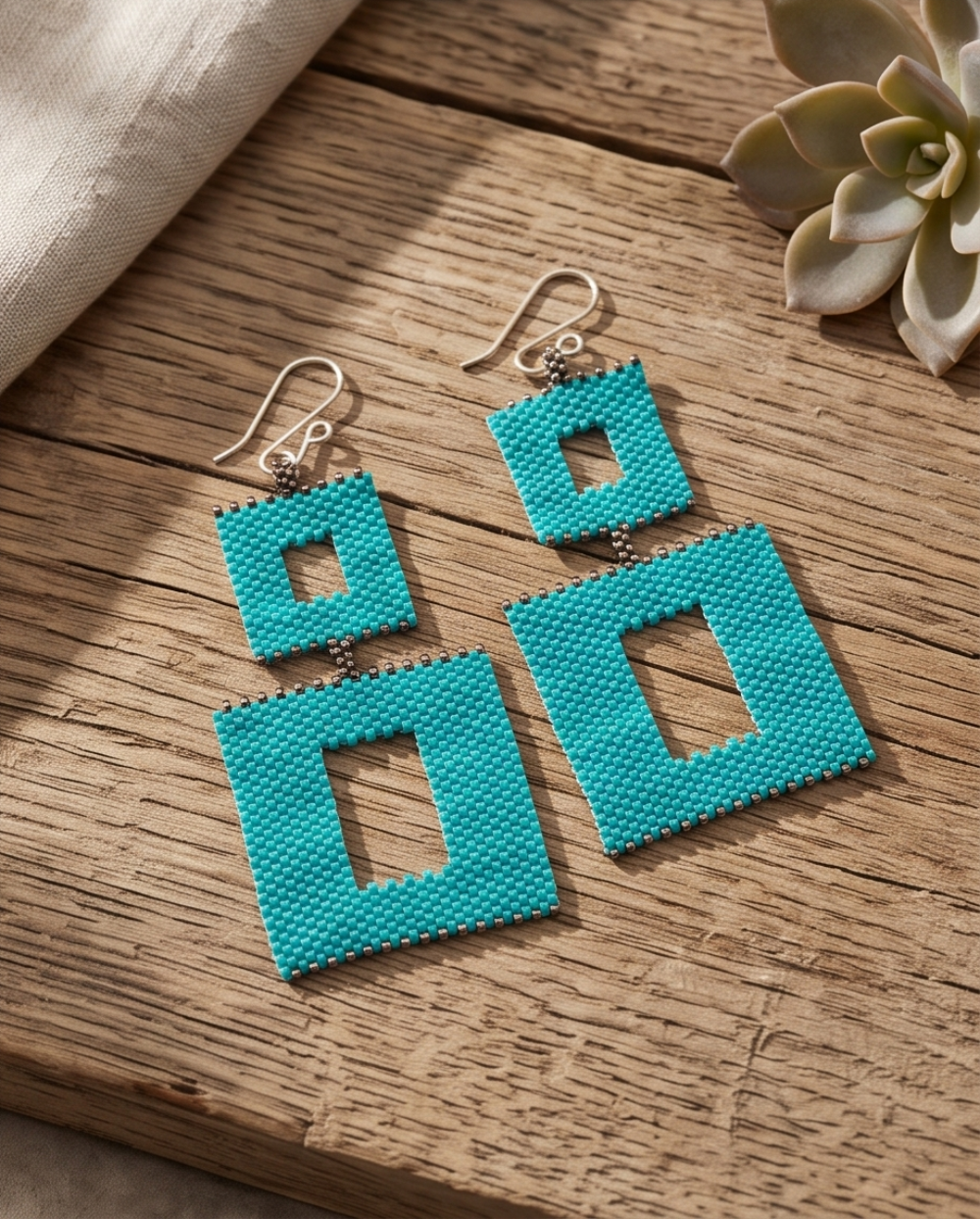 Miyuki handmade earrings peyote technnique on a table 