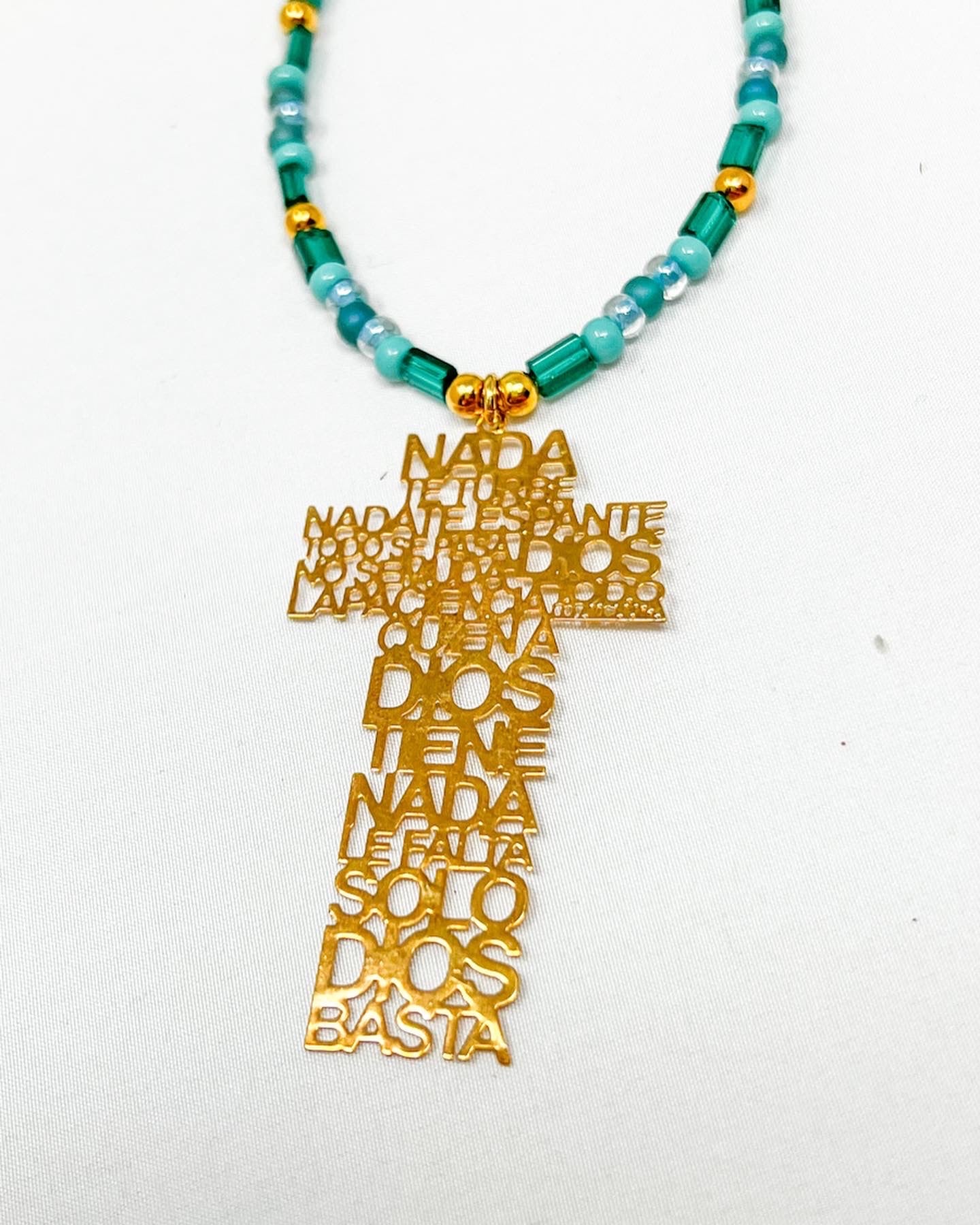 Green Crystals and  Gold Plated Cross